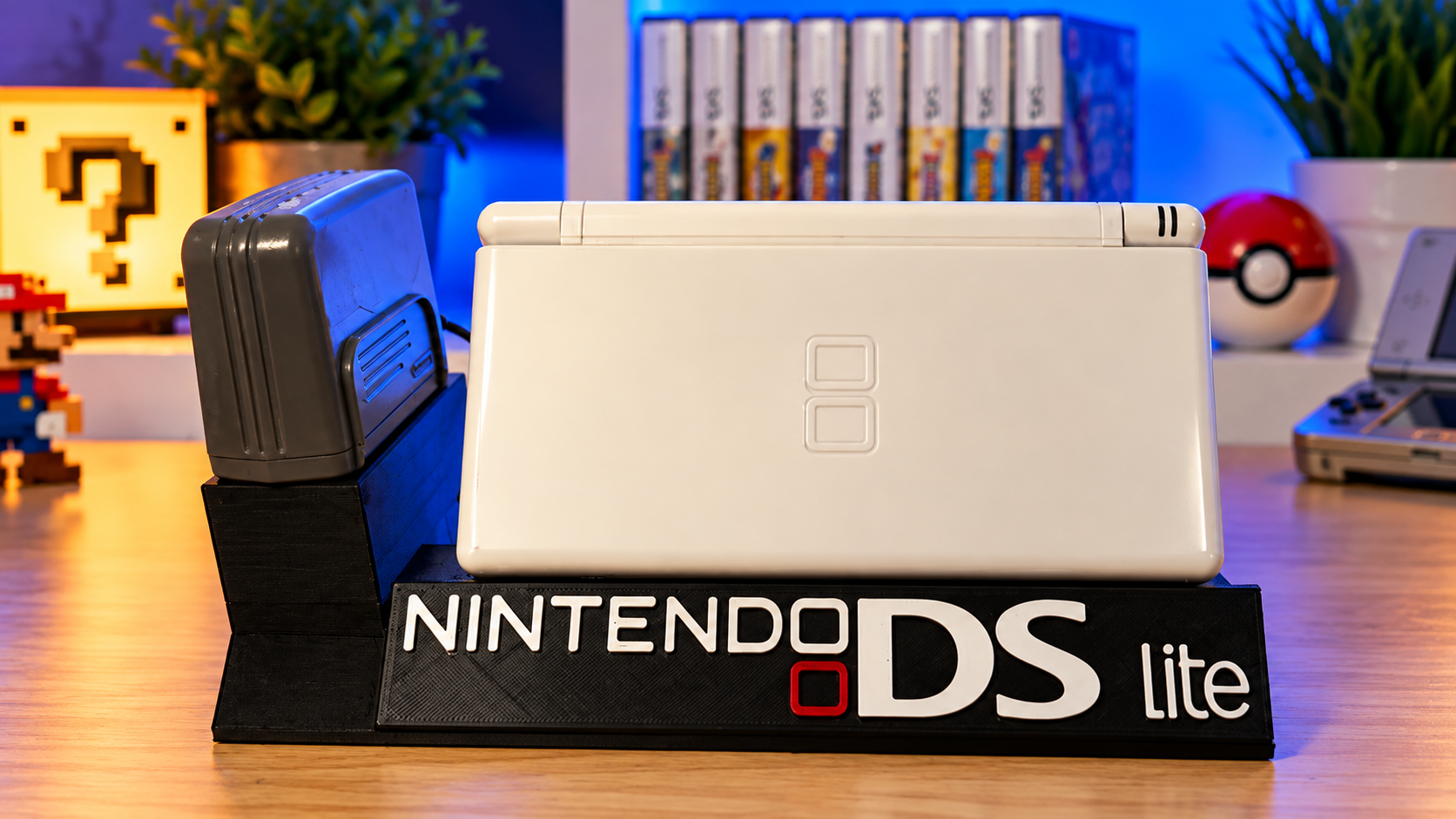 Suporte Nintendo DS Lite com espaço para jogos