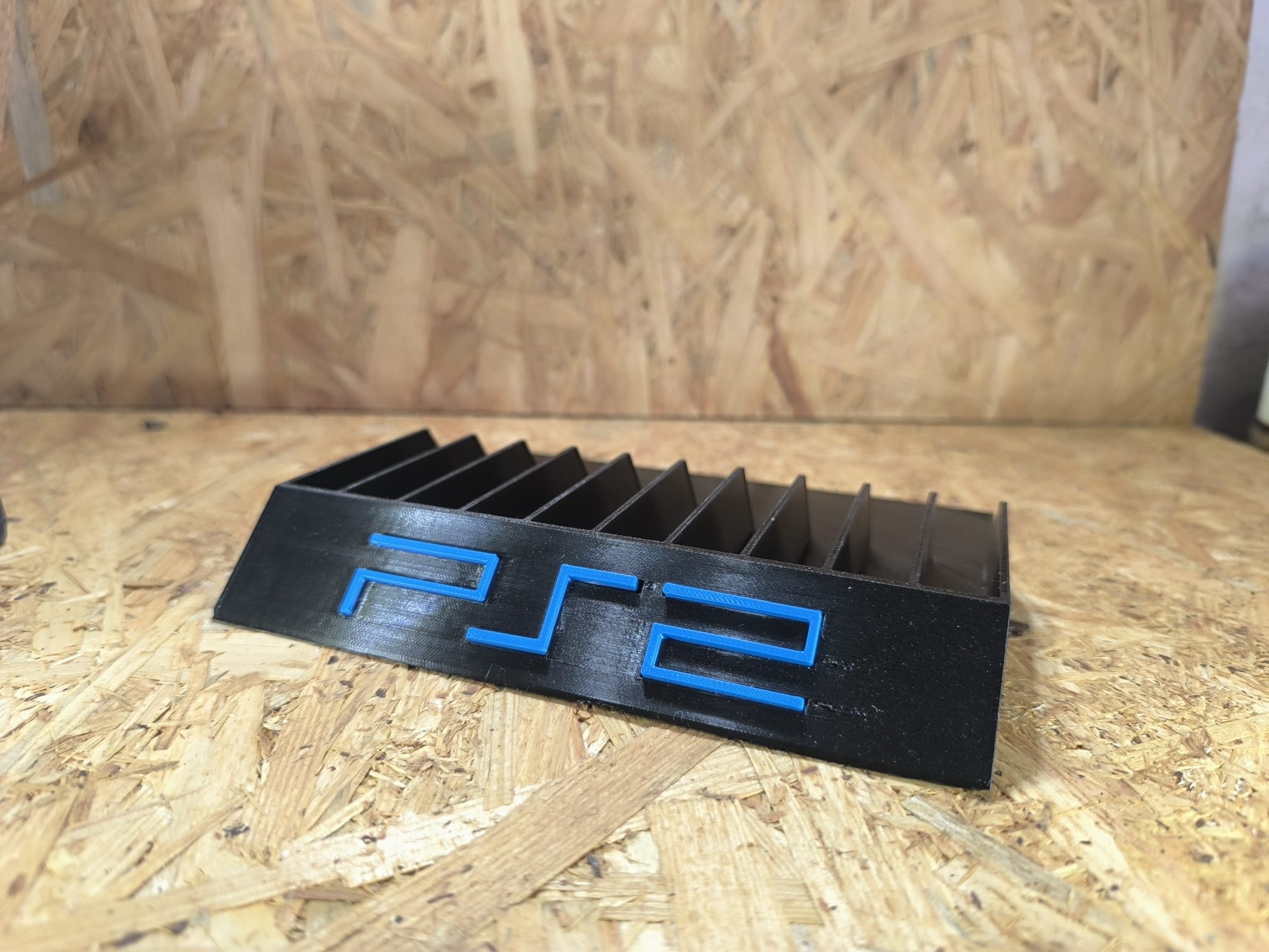 Suporte organizador para jogos PS2 — fotografia 3