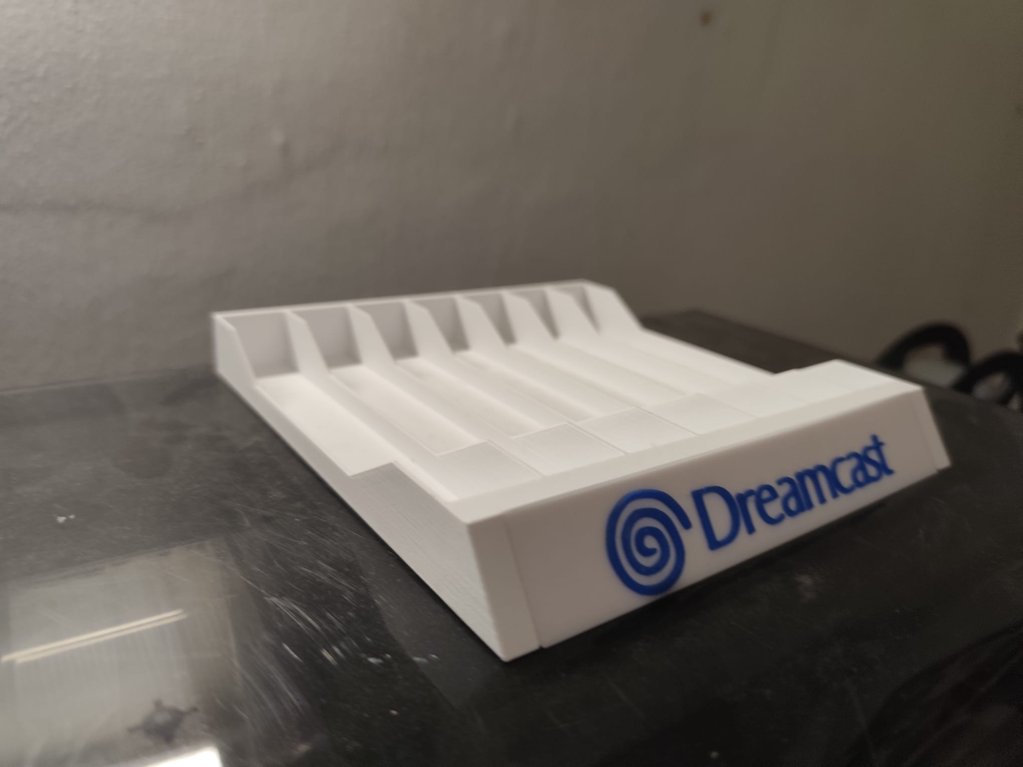 Suporte de jogos Dreamcast branco — fotografia 2